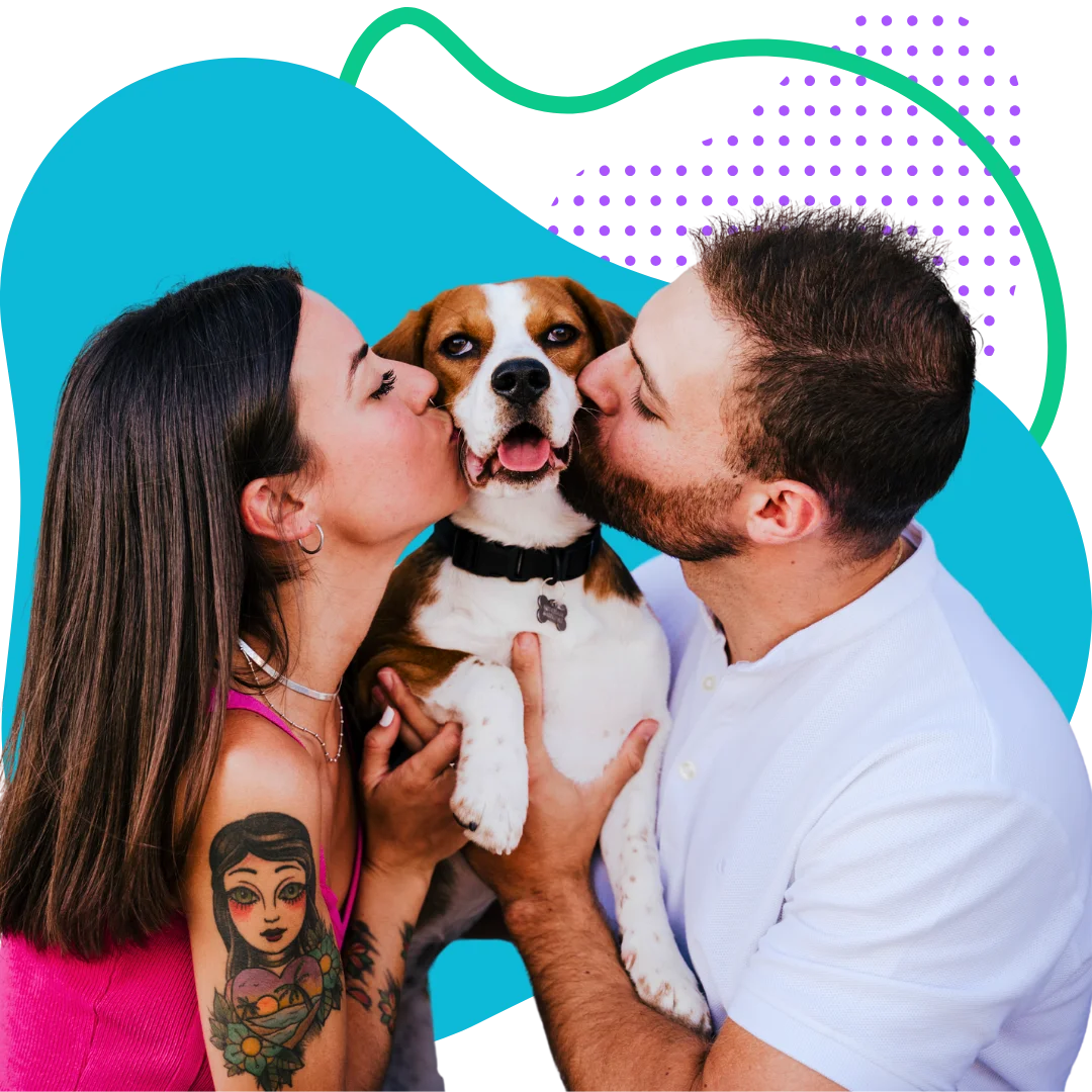 man and woman kissing their dog with a colorful abstract background